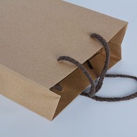 SKEPB004 Customized solid color kraft paper bag Garment bag Tote bag Green gift bag Eco bag manufacturer side view SKEPB004 Customized solid color kraft paper bag Garment bag Tote bag Green gift bag Eco bag manufacturer side view